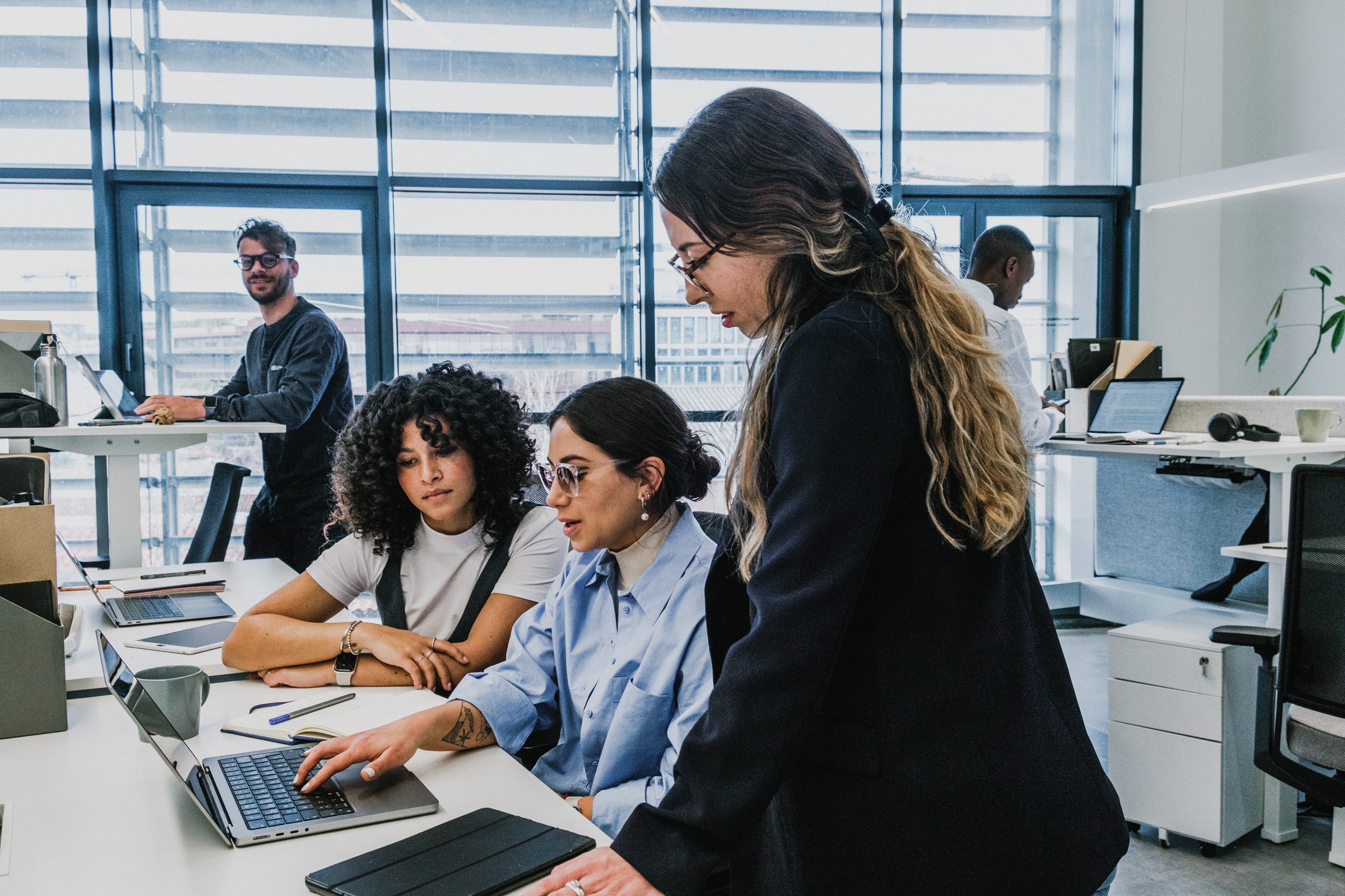 Cool Corporate Team Working Together in an Office